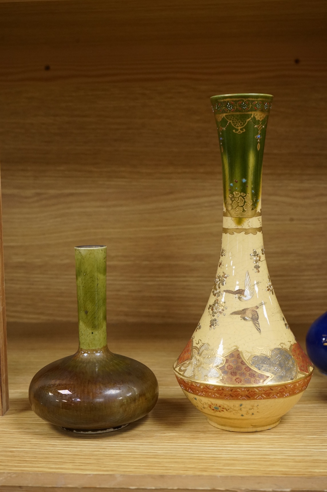 Three Japanese bottle neck vases and a Satsuma example, signed to the base, largest 25cm high